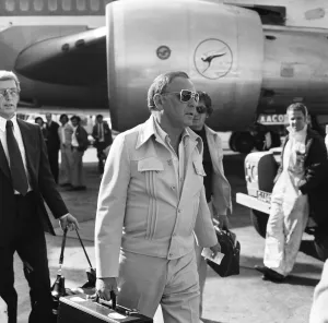 00303 Prints: Singer Frank Sinatra seen here arriving from Australia at London Airport 18th July 1974