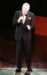 Tuxedo Prints: Singer Frank Sinatra seen here performing on stage at the Royal Albert Hall