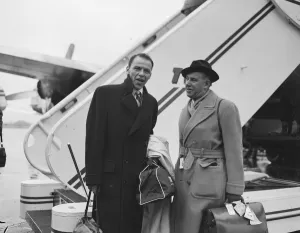 Singer Frank Sinatra seen here with Sunday People journalisrt Arthur Helliwell about to