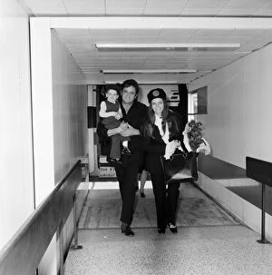 Folk Collection: Singer Johnny Cash arrives at Heathrow Airport from Manchester with his wife June Carter