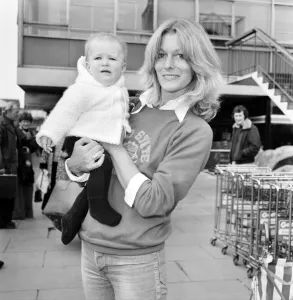 Babies Prints: Singer Rona Newton-John (sister of Olivia Newton-John) arrived at Heathrow Airport