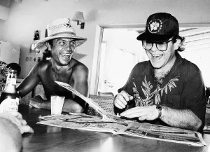 Knighthood Prints: Singer and songwriter Elton John with his co-star lyricist Bernie Taupin seems happy once