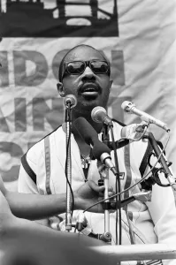 00992 Prints: Singer Stevie Wonder addressing the crowd at the GLC London Against Racism rally