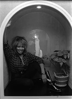 Singer Tina Turner on tour photographed in her hotel room in Paris