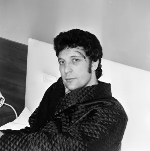 Singer Tom Jones at home with stitched head wound caused by a recent car crash