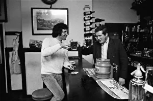 Pint Prints: Singer Tom Jones has a quiet drink at his local in Weybridge after missing fans