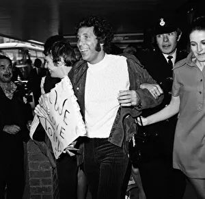 Singer Tom Jones was welcomed home today at Heathrow Airport when he arrived back from a