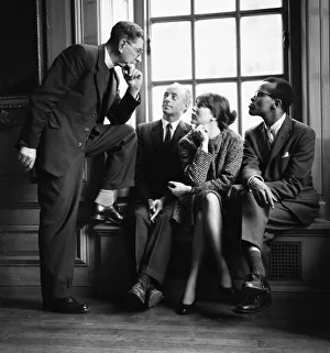 Singers Dave Lambert, Jon Hendricks and Annie Ross talking to Reverend Collins