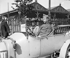 Belgium Prints: Singleson Head Boy Scout seen here being driven in Antwerp September 1914