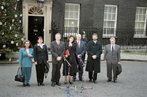 Northern Ireland Prints: Sinn Fein leader Gerry Adams flanked by his party deputies faces the media outside Number