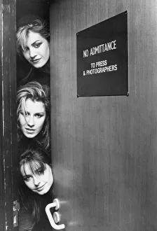Top to bottom - Siobhan Fahey, Sarah Dallin and Keren Woodward of Bananarama peek round