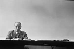 01190 Prints: Sir Alec Issigonis designer of the Morris Minor and the Mini seen here in his Longbridge