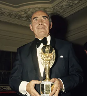 Dinner Jacket Prints: Sir Alf Ramsey seen here with a replica of the 1966 World Cup for his testimonial dinner