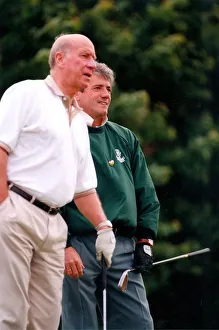 Sir Bobby Charlton and Kevin Keegan discuss how to play the next hole at the City of