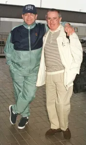 Sir Elton John leaving Heathrow on his way March 1998 to Australia with manager