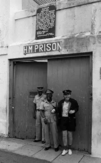 Sir Elton John pictured outside the jail in the West Indies on the Island of Monstserrat