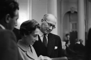 Sir John Wolfenden (right) meets members of the press at the Waldorf Hotel for