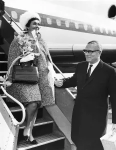 Sir Laurence Olivier actor and wife Joan Plowright actress arriving at London Airport