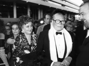 Sir Laurence Olivier actor and wife Joan Plowright actress outside National Theatre
