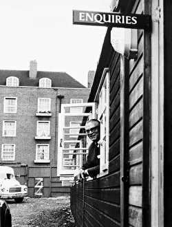 Sir Laurence Olivier actor at window of National Theatre offices in Duchy Street London