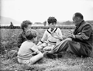 00206 Prints: Sir Malcolm Campbell seen here talking to some young admirers inbetween tests he is