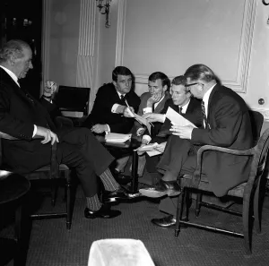 Paddy Crerand Prints: Sir Matt Busby David Herd Pat Crerand and Denis Law Dec 1967 discuss the Lloyd case