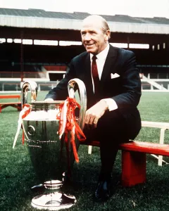 Sir Matt Busby manager of Manchester United poses at a pres season photocall with