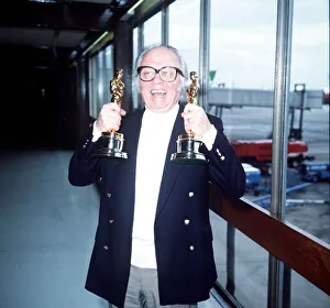 Awards Ceremonies Prints: Sir Richard Attenborough Actor / Director at Heathrow airport with the Oscars he won for