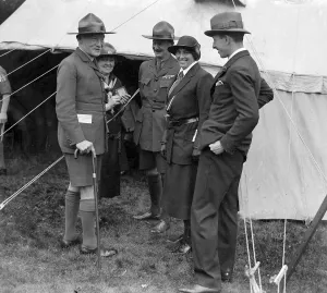 Sir Robert Baden Powell left seen here at a Scout rally with senior scout masters