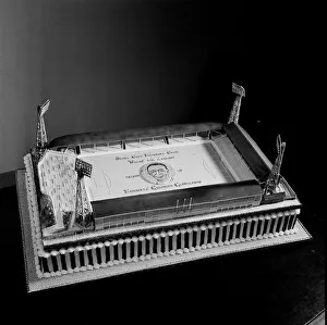 Sir Stanley Matthews Cake April 1965 Mr Thomas 54 cake maker is putting