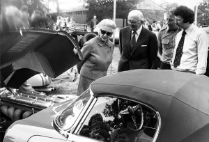 Show Prints: Sir William Lyons, founder and chairman of Jaguar Cars and Lady Lyons look at an E-type