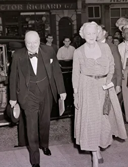 Sir Winston Churchill seen here arriving at the Scala Theatre with his wife. August 1952