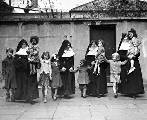 Sisters of Mercy looking after the homeless children of the East End of London