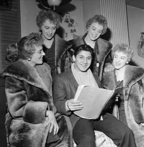Sixteen year old Canadian singer songwriter Paul Anka pictured rehearsing with the Gitsom