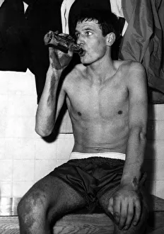 Coca Cola Prints: Sixteen year old Cardiff City footballer John Toshack enjoys a celebration drink