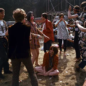 Sixties Fashion 1960s clothing Hippies at flower festival with writing all