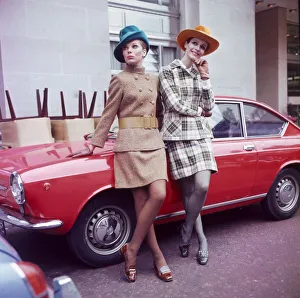 Sixties Fashion 1960s clothing Women with hats leaning on car