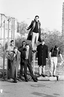 Ska group Madness pose in London whilst filming their new video. 30th January 1984
