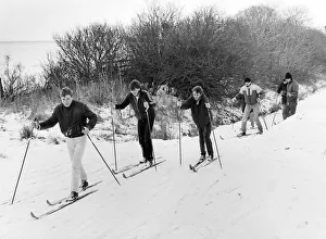 Skiers take advantage of the snow, enjoying a brisk walk along Castle Eden Walkway
