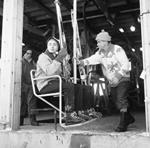 Winter Sports Prints: Two skiers seen here boarding the recently opened White Lady chair lift on Cairngorm 3rd