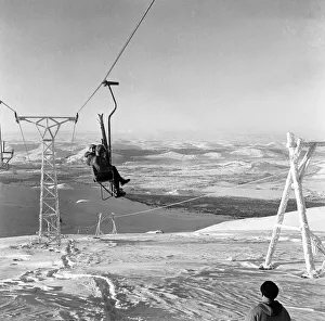 Winter Sports Prints: Two skiers seen here on the recently opened White Lady chair lift on Cairngorm 3rd