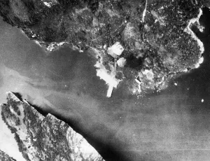 Skua planes of the Fleet Air Arm attack oil tanks and the jetty at Dolvik, near Bergen