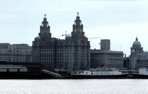 Skyline of Liverpool showing the Liver Building from across the Mersey river