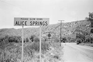 00671 Collection: Slow down sign at the entrance to the town of Alice Springs, Australia. 1st February 1976