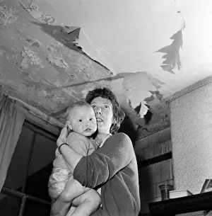 Mother Prints: Slum housing in Salford. Mrs Moore and her 1 year old son Peter