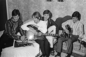 00807 Prints: The Small Faces pop group pictured in a provincial hotel room as they watch their latest
