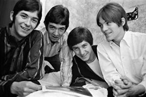 00807 Prints: The Small Faces pop group pictured in a provincial hotel room as they watch their latest