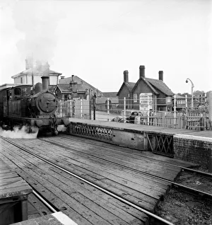 00014 Prints: A small tank engine pulls into the railway station at Halesworth Suffolk
