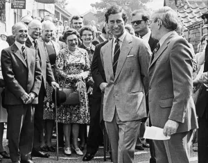 Cleveland Prints: A smiling Prince Charles talks to villagers as he walks around the streets of Great Ayton