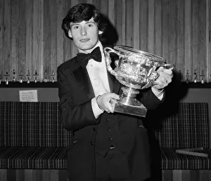 00677 Prints: Snooker player Jimmy White pictured receiving a trophy from Cliff Thorburn at Kingston